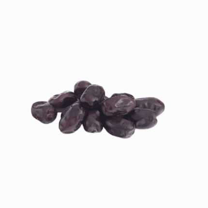 High-quality organic dark dates piled together, a nutrient-dense superfood for a natural health and wellness lifestyle.