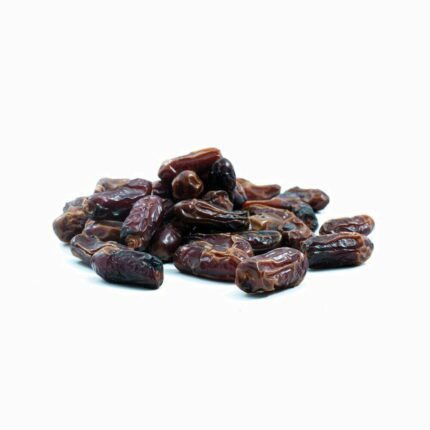 Dark Shakhouni dates in a heap, offering high-quality organic and conventional products for a natural health lifestyle.