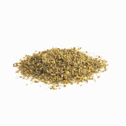 A pile of organic dried chamomile flowers for herbal tea, promoting a calming wellness ritual and relaxation.