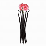 Dark Bourbon vanilla beans topped with pink flowers for high-quality organic and conventional products and natural health.