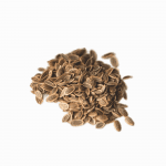 A pile of dried organic dill seeds, representing high-quality organic products for a natural health lifestyle.