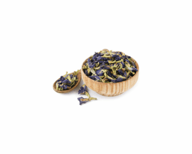 Dried blue mallow flowers in a wooden bowl and spoon, highlighting organic products for a natural health wellness lifestyle.