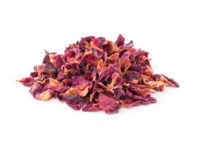 A heap of rose petals for herbal tea, a fragrant organic product for a natural health and wellness lifestyle.